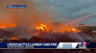 Three-alarm fire tears through Orange County lumber yard