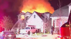 Four dogs, family escape fast-moving fire on west-side