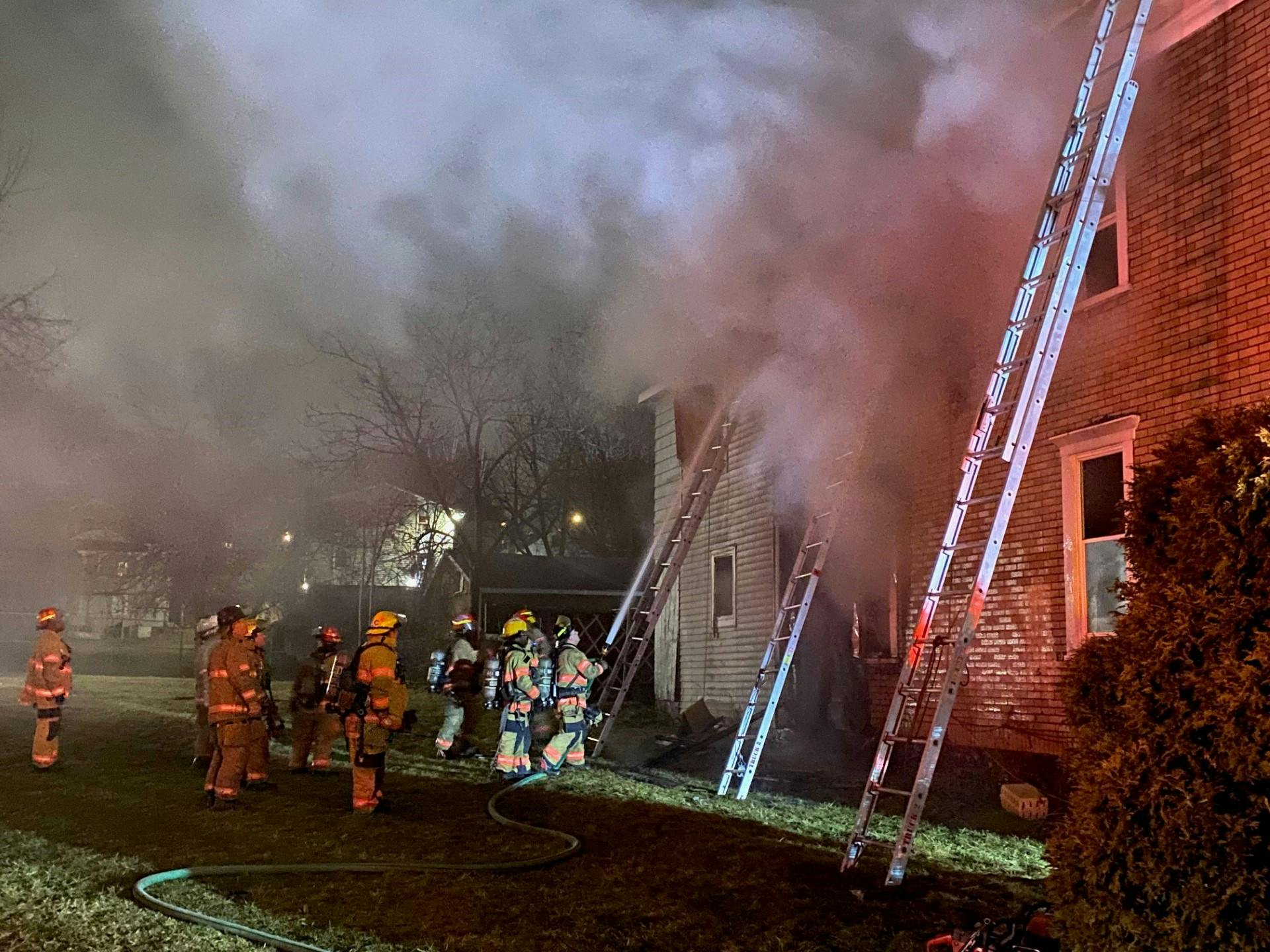 Syracuse firefighters battled a house fire Thursday night.