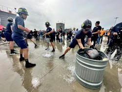 The last event of the fire explorer muster was a bucket brigade. The last event of the fire explorer muster was a bucket brigade.