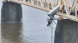Drone video captures dramatic rescue of woman stuck in semi truck dangling over Louisville bridge