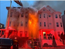 Two three-alarm fires were reported four hours apartment Saturday in Boston. Several firefighters suffered minor burns at one of the fires scenes. Two three-alarm fires were reported four hours apartment Saturday in Boston. Several firefighters suffered minor burns at one of the fires scenes.