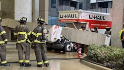 Using heavy-duty wreckers and extrication equipment, the beam was only lifted a few inches to free the driver.