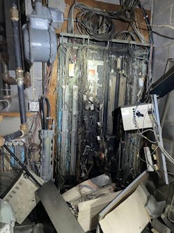 Shown here is the interior of the communications closet where the explosion occurred. The concentration of heat to the area that was directly above the conduit is visible. Shown here is the interior of the communications closet where the explosion occurred. The concentration of heat to the area that was directly above the conduit is visible.