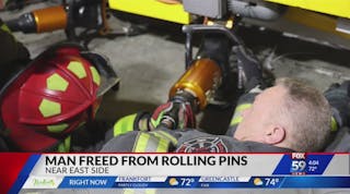 Firefighters rescue man after leg trapped in rolling machine