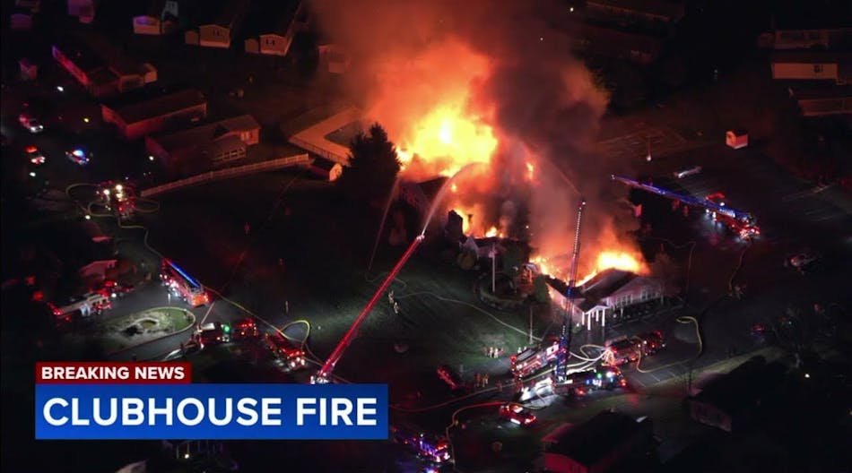 Firefighter battle massive fire at Village of Neshaminy Falls clubhouse in Montgomery Township, Pa