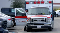 A Falck ambulance is checked out by EMS personnel.