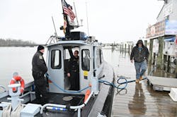 Members of the Maryland Transportation Authority Police fuel their boat at Anchor Bay East Marina in Dundalk on March 27, 2024.