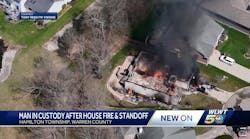 Officials: Man taken into custody after massive house fire in Hamilton Township