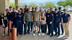 Arlington firefighter Brady Weaver (center, green shirt) was released a week after he was shot while responding to a welfare check. Arlington firefighter Brady Weaver (center, green shirt) was released a week after he was shot while responding to a welfare check.