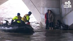 River rescue amid flooding under bridge in downtown Columbus River rescue amid flooding under bridge in downtown Columbus