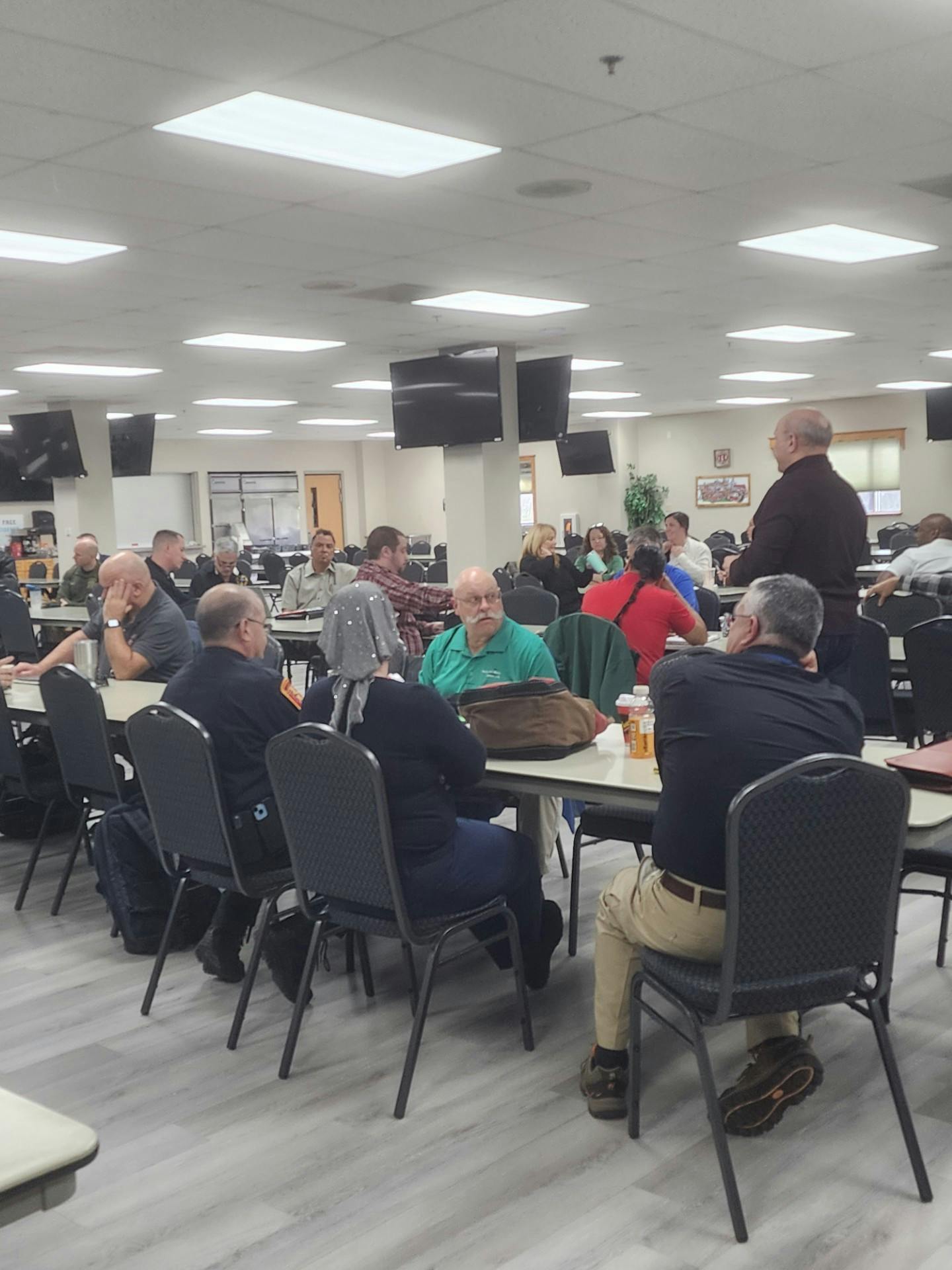 Chief Ron Kanterman, standing. leads a discission during the National Fallen Firefighters Memorial Service planning meeting Monday.