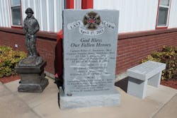 Three memorials, including a bench and a firefighter statue, are located outside the West Volunteer Fire Department's station. Three memorials, including a bench and a firefighter statue, are located outside the West Volunteer Fire Department's station.