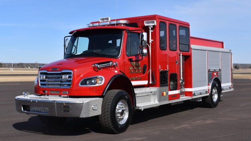 The Fertile Fire Department worked with CustomFIRE to design this top-mount, enclosed pump panel pumper.