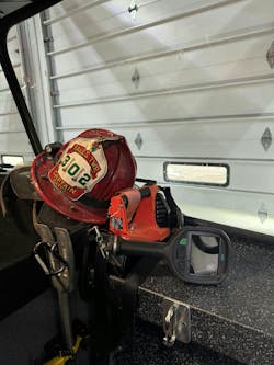 Successful engine crew truck work requires the rig to be set up accordingly. Here, the officer&rsquo;s seat of the Falls Township, OH, Fire Department&rsquo;s Engine Company 302 is flipped up to reveal a Halligan, a box light and a thermal imaging camera.