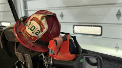 Successful engine crew truck work requires the rig to be set up accordingly. Here, the officer’s seat of the Falls Township, OH, Fire Department’s Engine Company 302 is flipped up to reveal a Halligan, a box light and a thermal imaging camera.