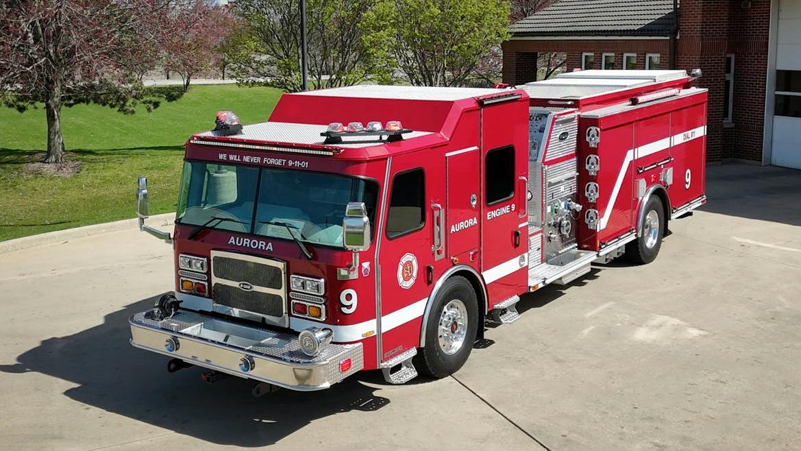 This top-mount pumper was built by E-ONE, through Fire Service, Inc. for the Aurora Fire Department.