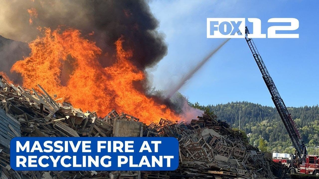 Massive fire contained but continues to burn at wood recycling plant in N Portland