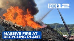 Massive fire contained but continues to burn at wood recycling plant in N Portland Massive fire contained but continues to burn at wood recycling plant in N Portland