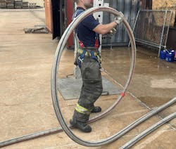 When moving a charged hoseline upstairs or deep into a structure around obstacles, a 'wheel' is a good option. This wheel has 12-15 feet of hose. When moving a charged hoseline upstairs or deep into a structure around obstacles, a 'wheel' is a good option. This wheel has 12-15 feet of hose.