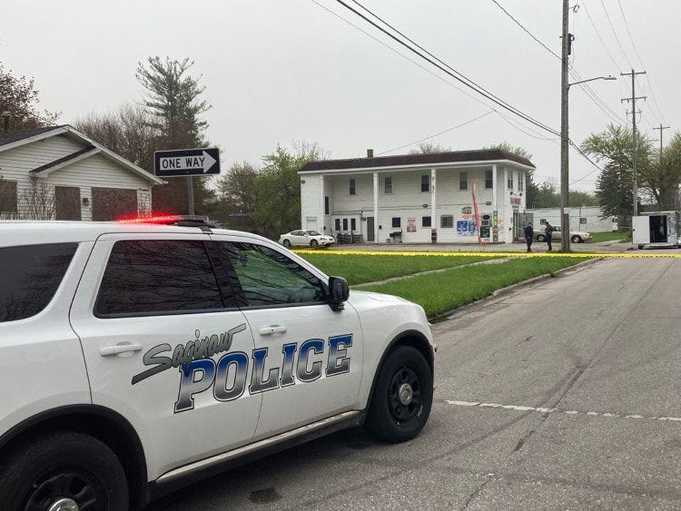 Saginaw police cordon off the 2700 block of South Jefferson Avenue after a body was discovered following a fire the morning of April 29, 2024.