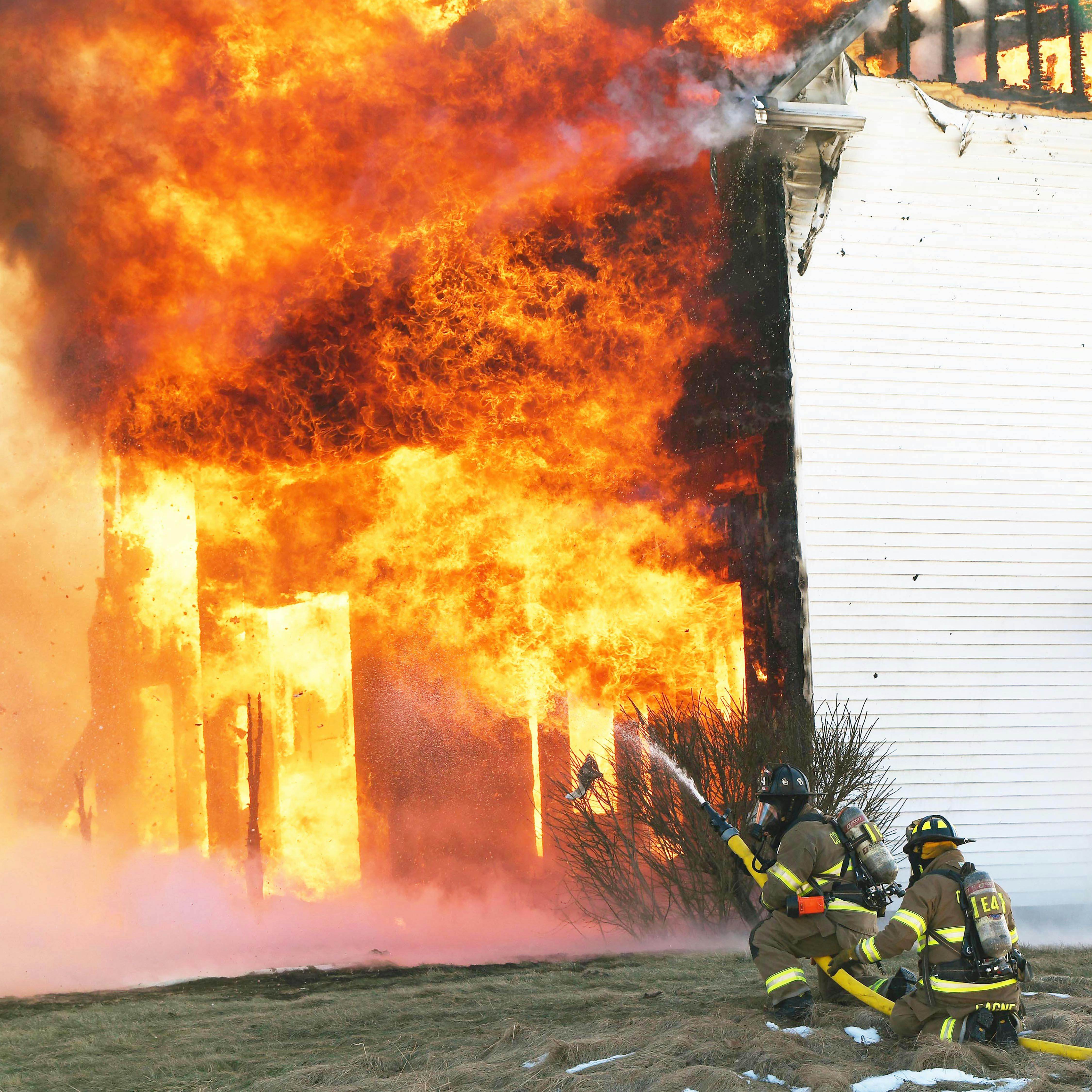 Members of the Hopkinton Fire Department battled 30&ndash;40 mph winds and a wind chill of -10 degrees Fahrenheit in knocking down a fully involved attached garage.