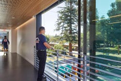 From the second floor of Palo Alto Fire Station No. 3, the firefighters can gaze upon the park, yet their privacy in the living quarters is maintained because of the strategic location of window fenestration