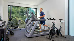 Large windows in fitness rooms, like this one in Palo Alto, CA, Fire Station No. 3, offer safety checks for those working out.