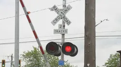 Passenger train strikes truck; crash victims are 2 adults, boy