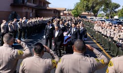 Colleagues saluted Los Angeles County Deputy Alfredo 'Freddy' Flores who died of injuries sustained in the fire. Colleagues saluted Los Angeles County Deputy Alfredo 'Freddy' Flores who died of injuries sustained in the fire.