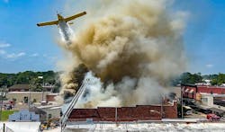 Firefighters and a small plane apply water as flames gut Nicks on 2nd, a downtown restaurant in Eunice, LA. Firefighters and a small plane apply water as flames gut Nicks on 2nd, a downtown restaurant in Eunice, LA.