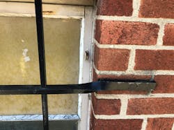 A flathead axe or the adz of a Halligan can be shoved between the tab of bars that are attached to brick to work loose the carriage bolt that connects the two. A flathead axe or the adz of a Halligan can be shoved between the tab of bars that are attached to brick to work loose the carriage bolt that connects the two.