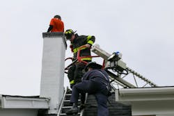 Around 4:00 p.m., a 10-year-old child climbed out of a second-floor window, scaled up a steeply pitched roof, and climbed up and into the chimney. Firefighters arrived to find the child stuck feet first on top of a two-story wood-frame. Around 4:00 p.m., a 10-year-old child climbed out of a second-floor window, scaled up a steeply pitched roof, and climbed up and into the chimney. Firefighters arrived to find the child stuck feet first on top of a two-story wood-frame.