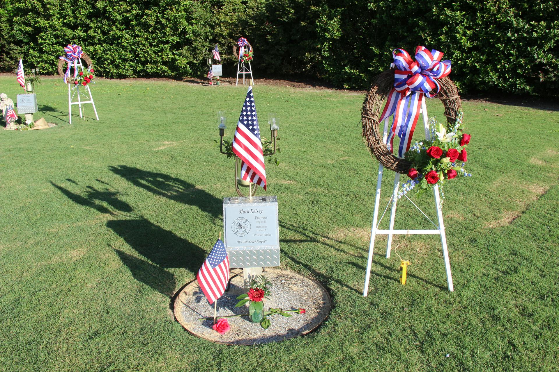 Ten years after the Sofa Super Store fire, on the site of the tragic blaze, the Charleston Fire Department held a remembrance ceremony to honor the Charleston 9. Nine markers are located throughout the site, each to recognize one of the fallen firefighters.