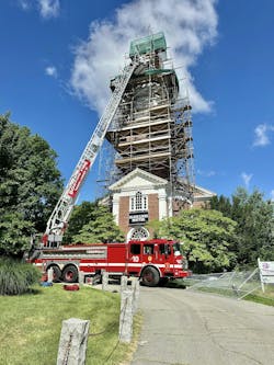 Boston fire officials said the worker fell about 20 feet from the steeple and they used an aerial to bring him 50 down to an ambulance. Boston fire officials said the worker fell about 20 feet from the steeple and they used an aerial to bring him 50 down to an ambulance.