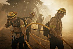 On Orwin road fire crews battle a hot spot at the Gorman Brush Fire in northern Los Angeles County on Sunday, June 16, 2024 in Gorman, CA.