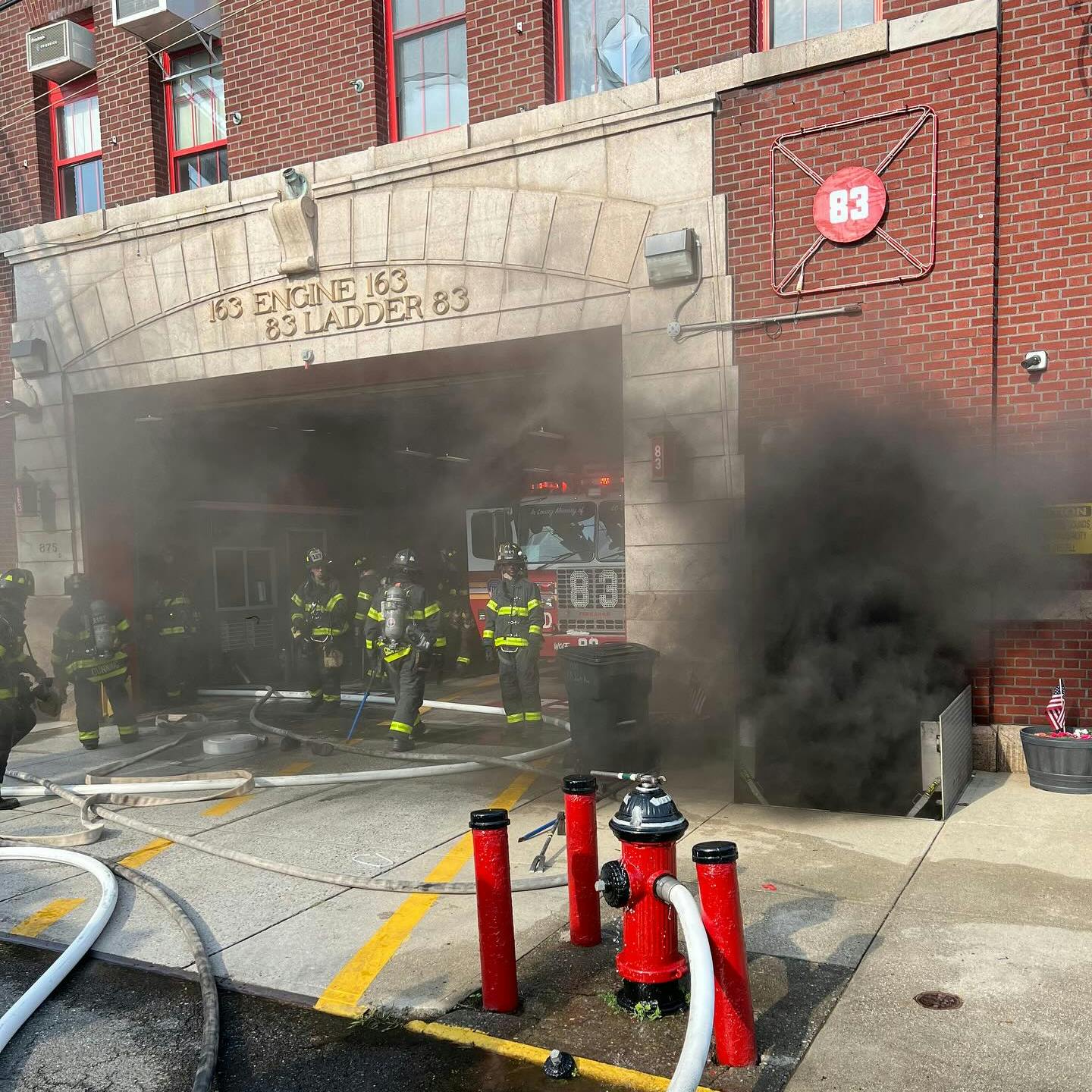 Firefighters from FDNY Ladder 83 returned to their station to find heavy smoke coming from the basement.