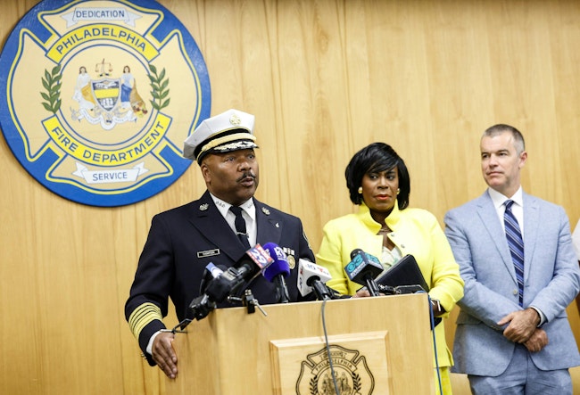 Newly named Philadelphia Fire Commissioner Jeffrey W. Thompson, left, with Mayor Cherelle L. Parker with Managing Director Adam Thiel.