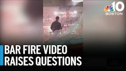 Video of man inside burning bar raises questions