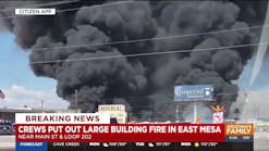 Crews battle large fire at RV repair shop in east Mesa