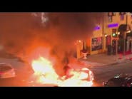 Street takeover in downtown LA ends with 2 cars burned