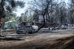 A home near Lake Oroville in Butte County was among four structures destroyed in the Thompson Fire on Wednesday.