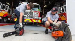 Hampden Township volunteer firefighters Dalton Forsyth (left) and Justin Taylor test saws.
