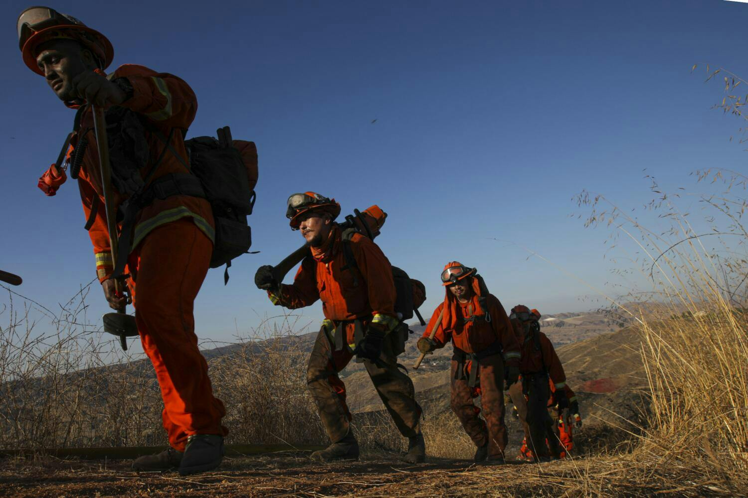 CAL FIRE inmate firefighters work at a recent wildland fire.