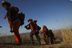 CAL FIRE inmate firefighters work at a recent wildland fire.