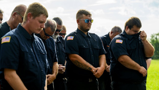 Firefighters, friends and family gathered for a ceremony Thursday dedicating a section of highway to fallen New Tripoli firefighters.