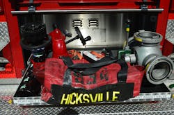 The rear body compartment on the new engines is outfitted with a slide tray to accommodate a portable monitor, a four-way hydrant valve and a hydrant bag. Fog master stream and smooth bore tips are carried. The rear body compartment on the new engines is outfitted with a slide tray to accommodate a portable monitor, a four-way hydrant valve and a hydrant bag. Fog master stream and smooth bore tips are carried.