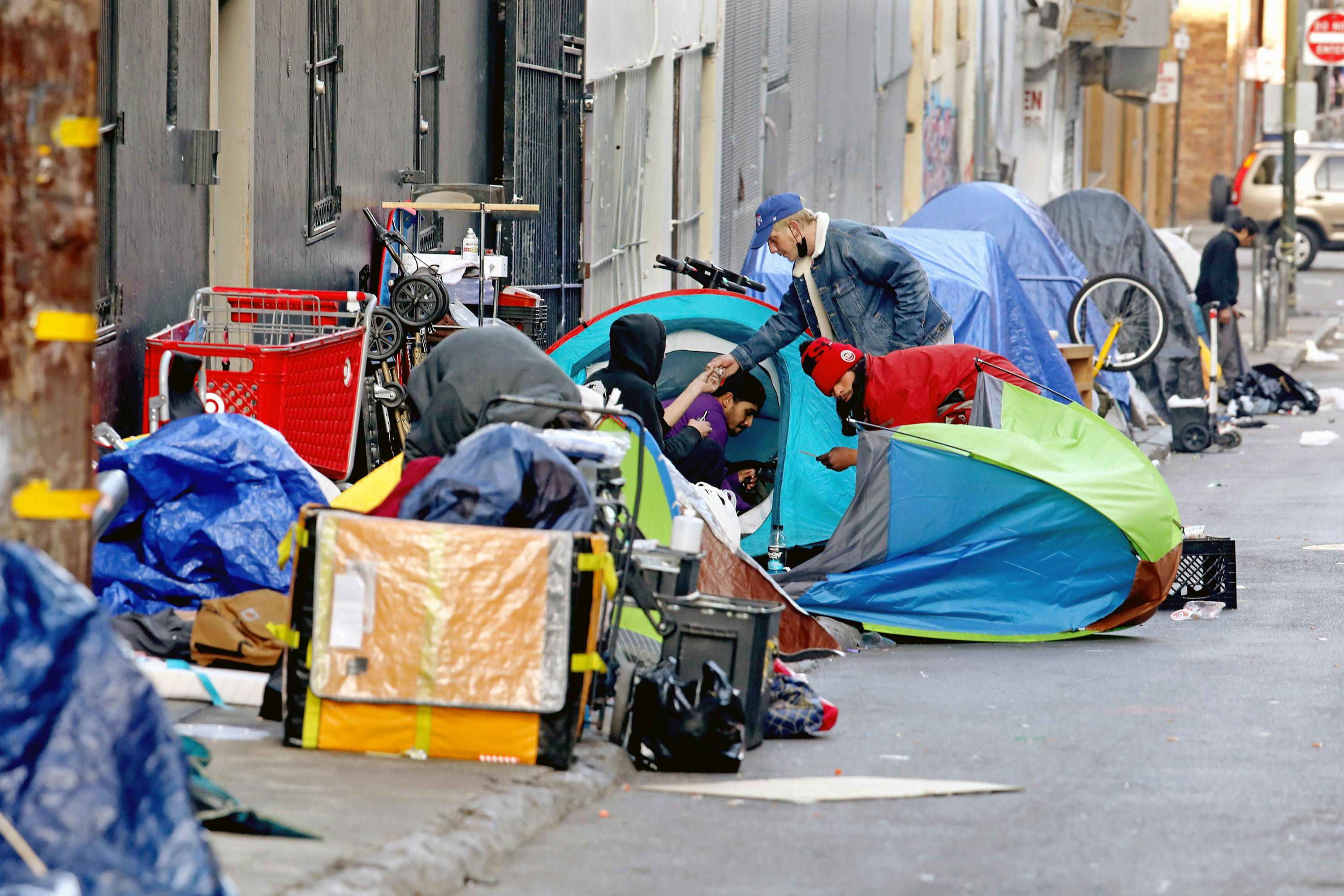 This file photo shows a homeless encampment in San Francisco. Fire, law and mental health agencies around Greely, CO, are looking at alternative response models to help with the growing call volume for homeless and mental health incidents.
