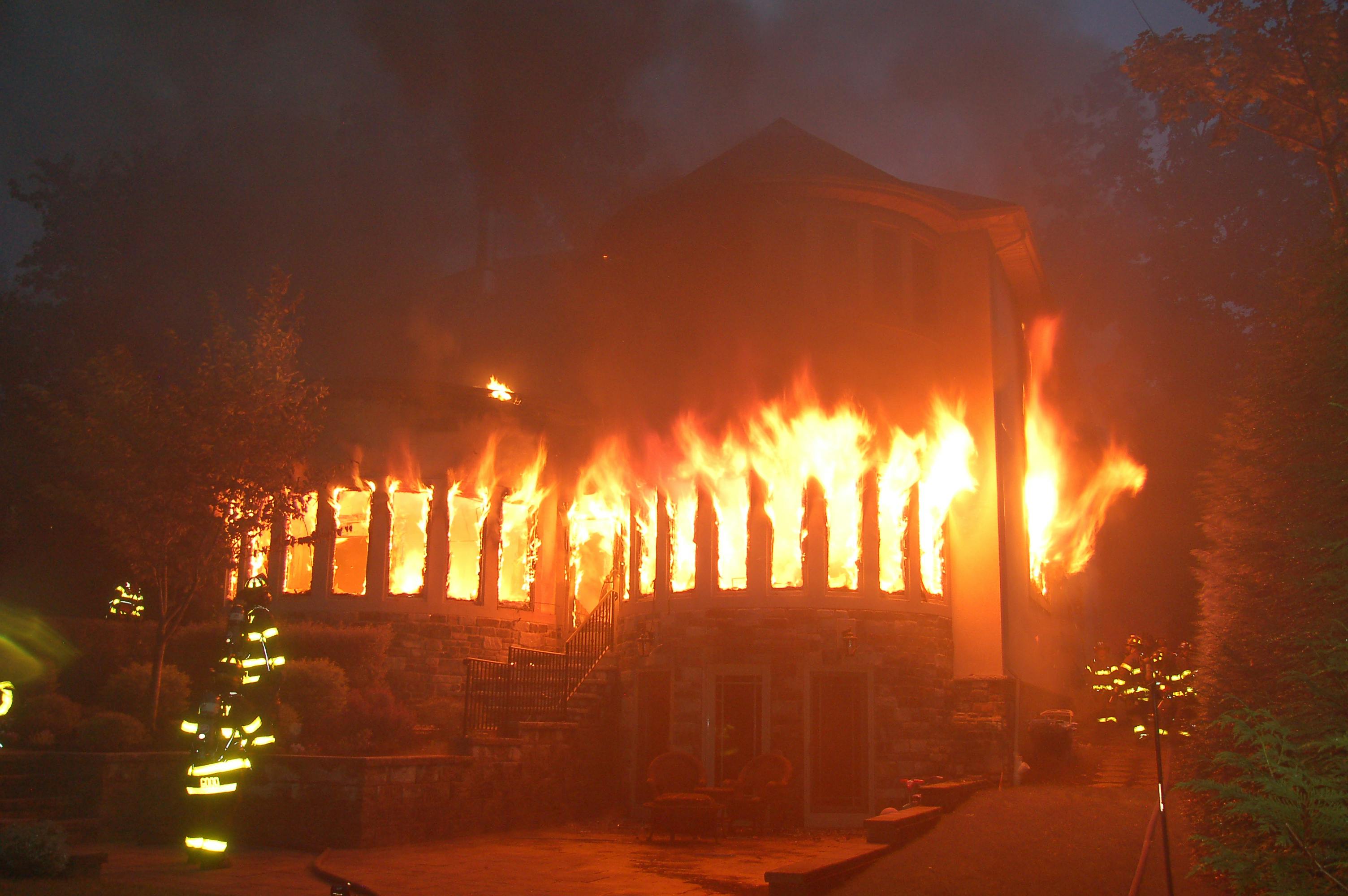 A fire on the second floor of an occupied, two-story apartment building ultimately ended up going through the roof and required a second alarm.