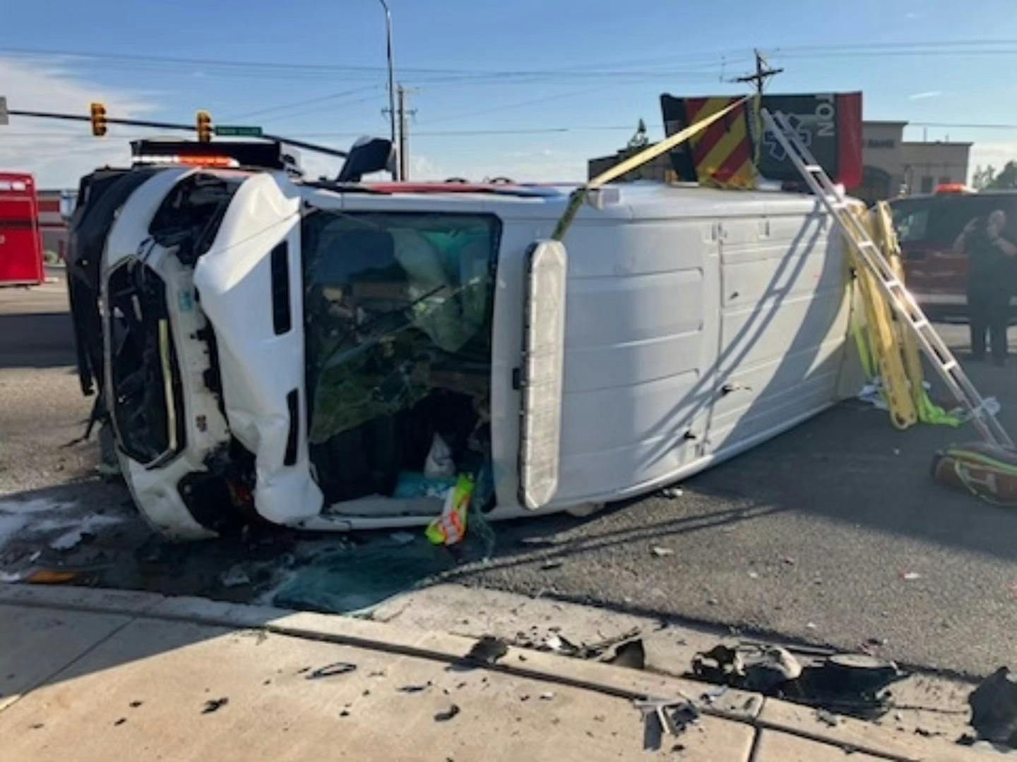The From Layton City Fire Department ambulance was transporting a 90-year-old critical care patient when it was struck.